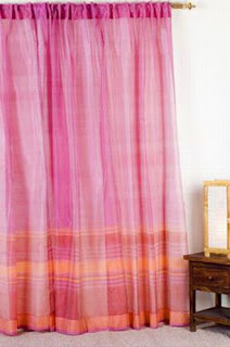 Pink curtain gives a romantic touch to the decor