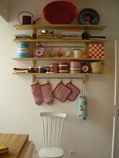 an aesthetically arrangement on kitchen shelf