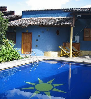 A splash in the blue pool photo by Vueltaa