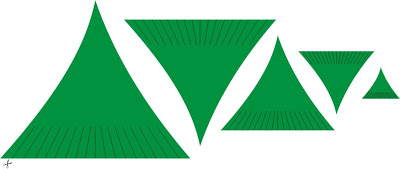 cutting the green crepe paper in triangular shapes