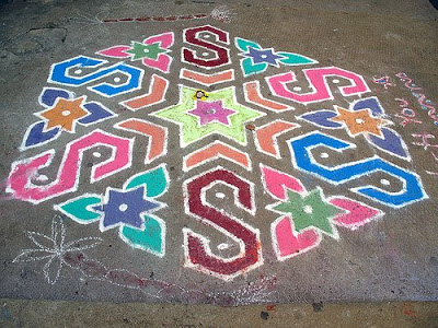 a colorful rangoli on the floor