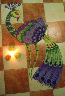 peacock rangoli made by rangoli powder and chalk
