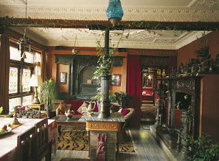 The living room has his collection of tantric art and Tibetan carpets