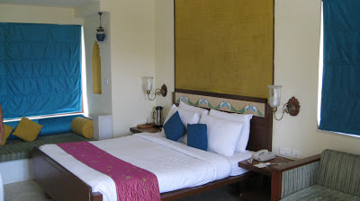 The peacock theme spills over to the room