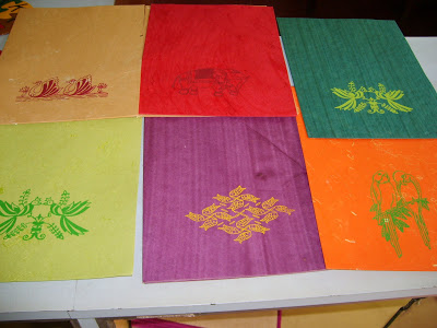 Folders with block print designs on recycled paper