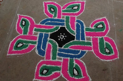 Parallel lines are used in this rangoli