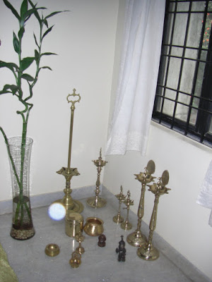 Old brass vessels at the corner of the room