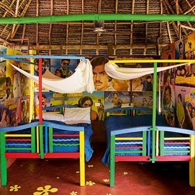 the bedroom is decorated in the Indian kitschy look