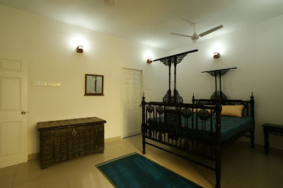 The antique chest adds character to the bedroom