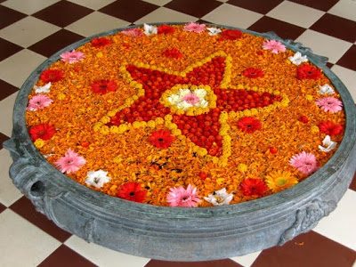 use a couple of petals from flowers and garnish a bowl filled with water