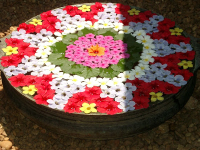 Floating petal from flower in a water pot