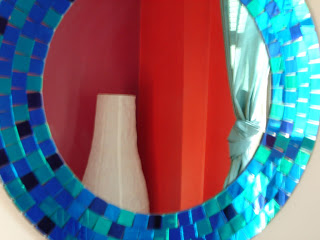 A beautiful azure mirror that lends part of it blueness to the curtains | Bella's room in Canada | theKeybunch decor