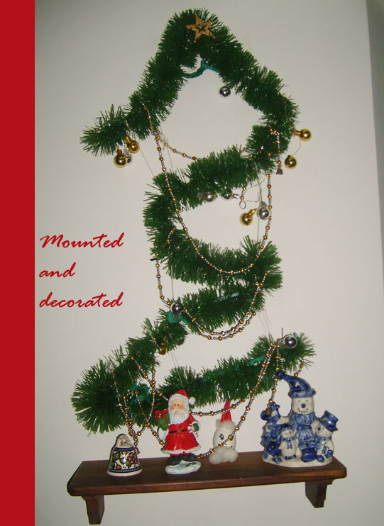 hanging christmas tree on the wall