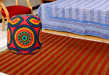 Rugs and Ottomans from online shop PureHomeDecor.com