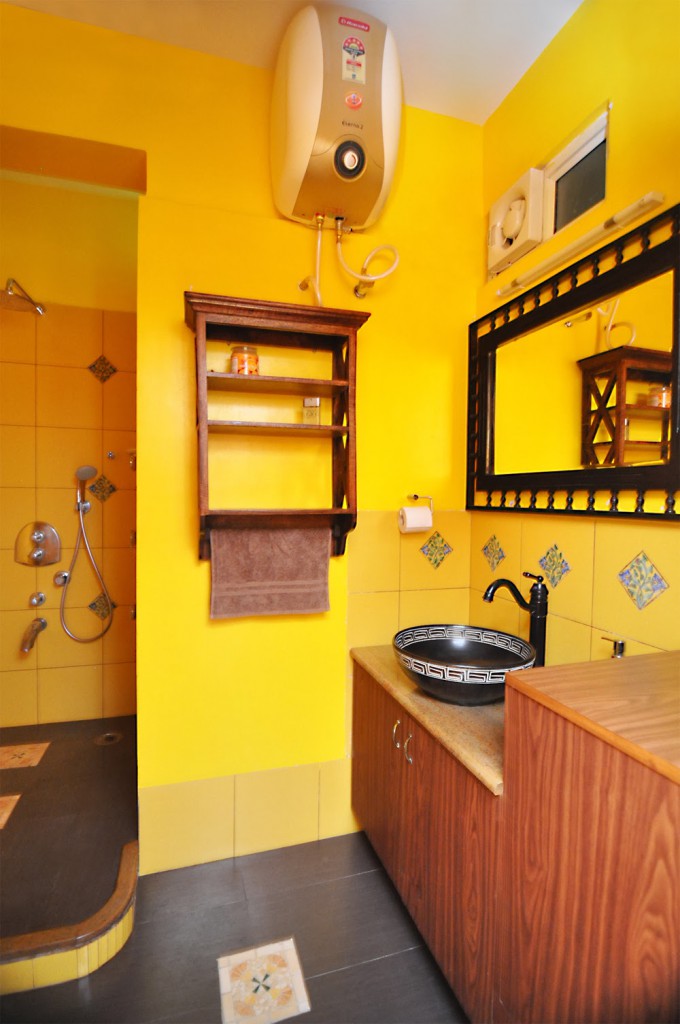 yellow bathroom, antique features, vanity