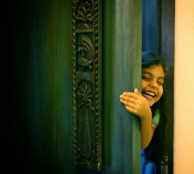 the little Indian munchkin at the door