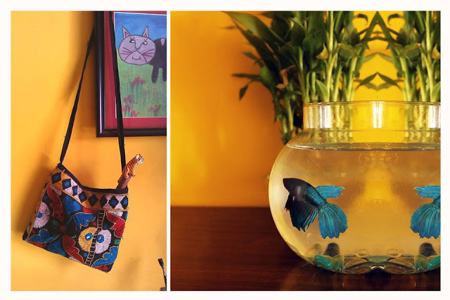 yellow wall, child art, fish bowl