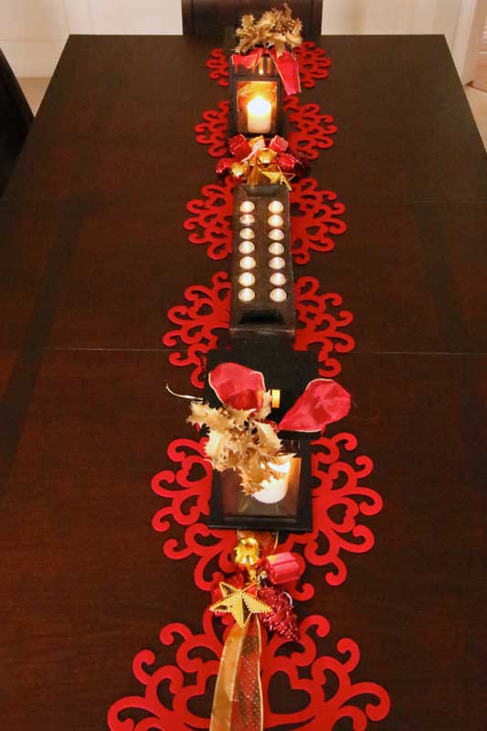 a lovely red felt runner on a dining table | Meera and Vijay's Christmas home Decor