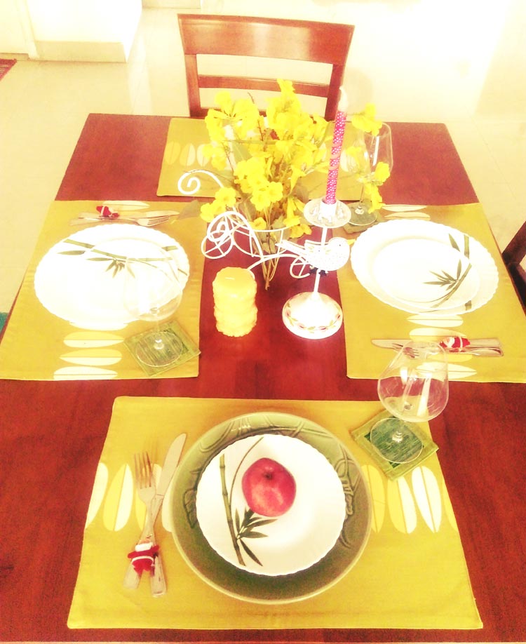 A yellow and lime green tablescape for Christmas