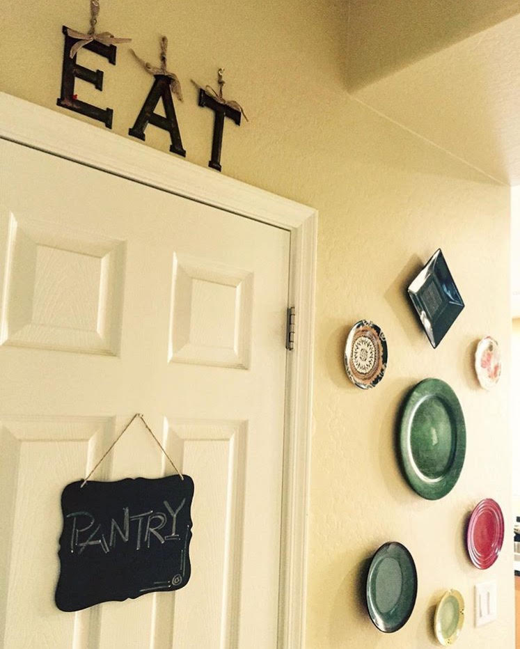 The plate wall is a charming addition to the dining area | Ethnic-Global Style home in Arizona