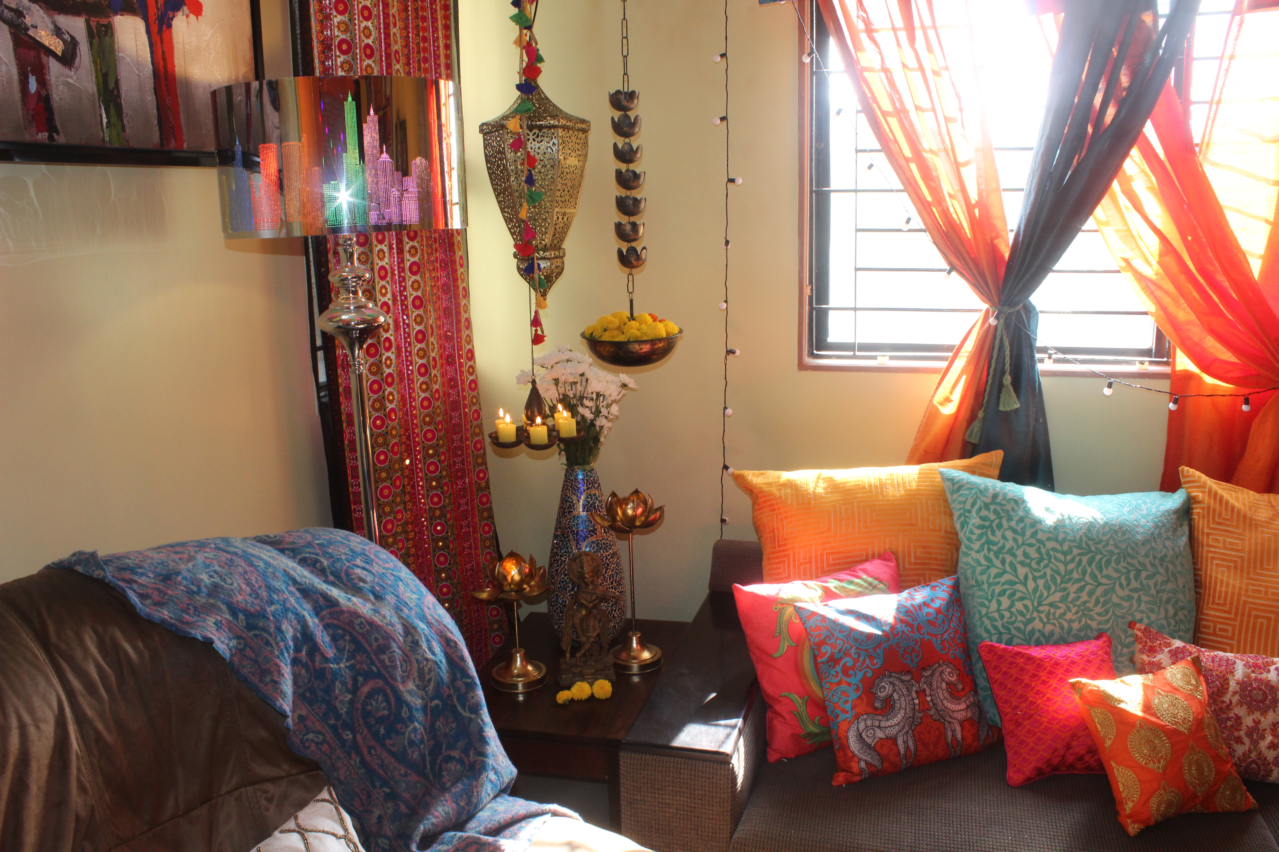 Brass collection at the corner of the living room | Color and dramatic at Bembem's Pune Home