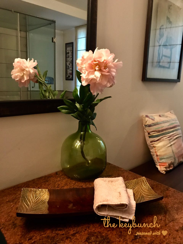 flower in green bottle