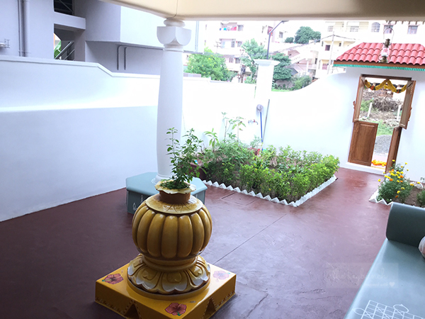the courtyard is beautiful, garden plots and a tulsi in the middle | Home built in Old Style | theKeybunch decor