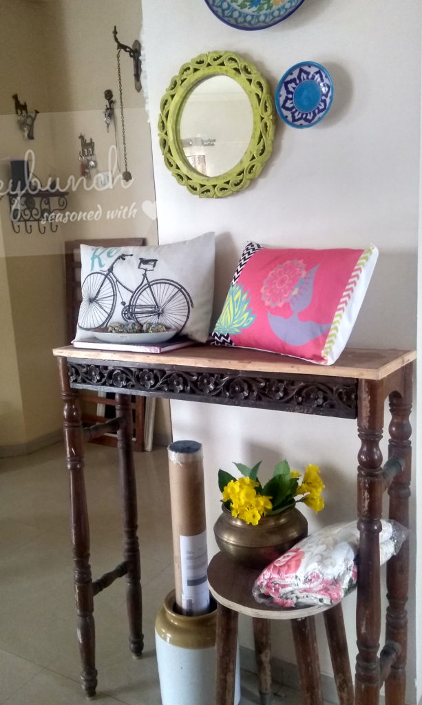 console table at the corner of the room