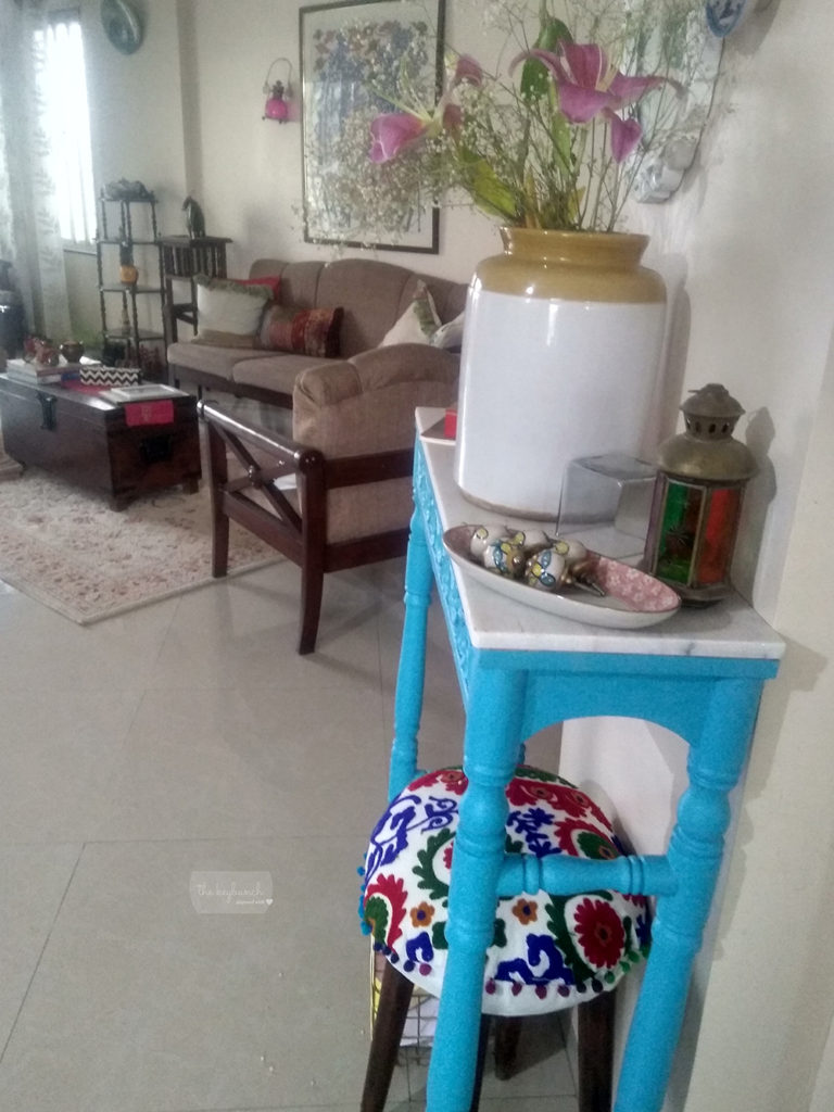 Console table at the corner of the living room