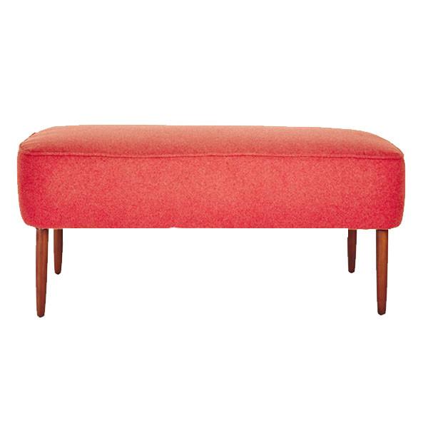Living Coral on an upholstered 