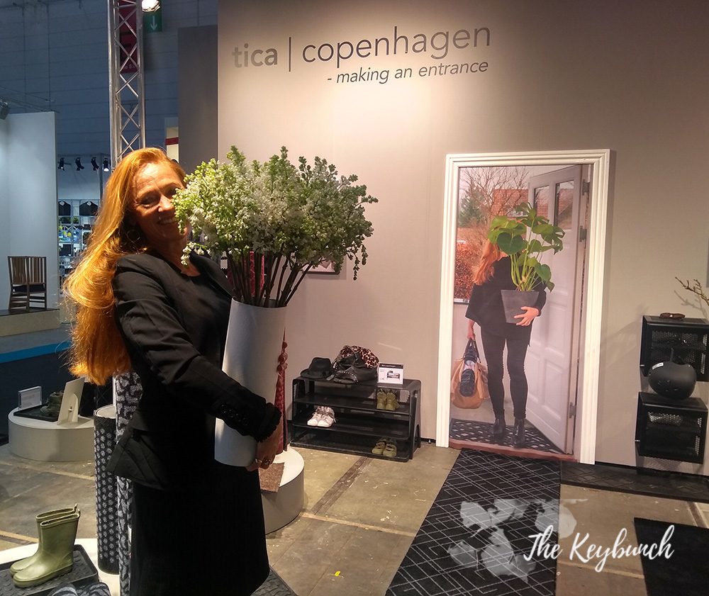 Tica Copenhagen founder of Tia Bremhholm posing with a pot, just like the one on the ad in her stall!