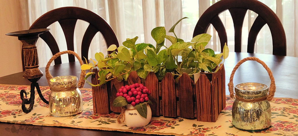 Jayashree Rajan's garden apartment tour on The Keybunch: dining table with green plants