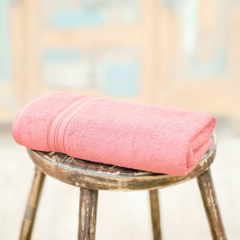 A bath towel in fresh peach color