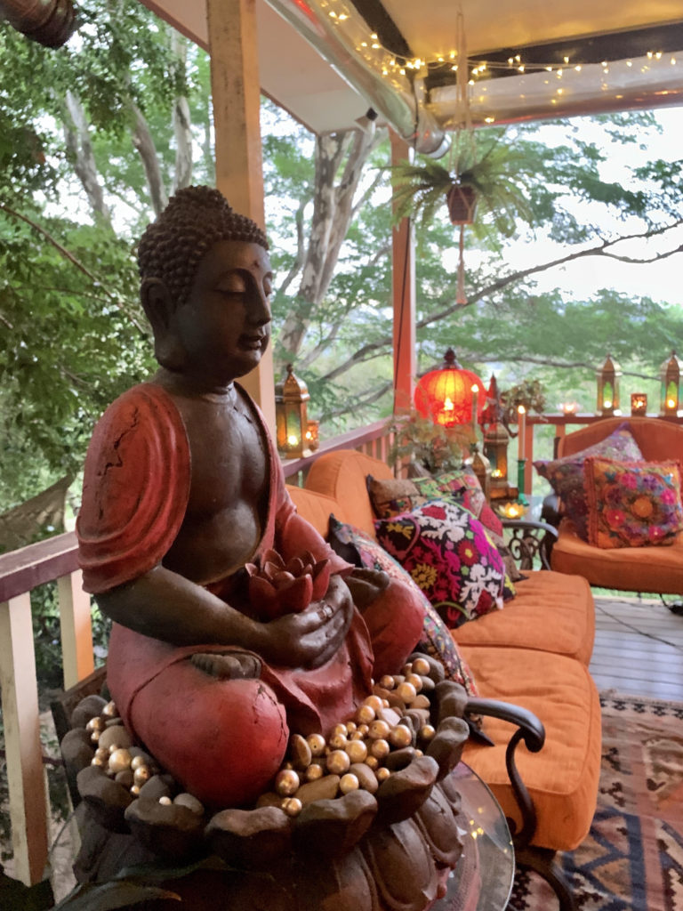 The gorgeous buddha is a water fountain, trickling water adds to the serenity | Martine's boho chic abode in Australia