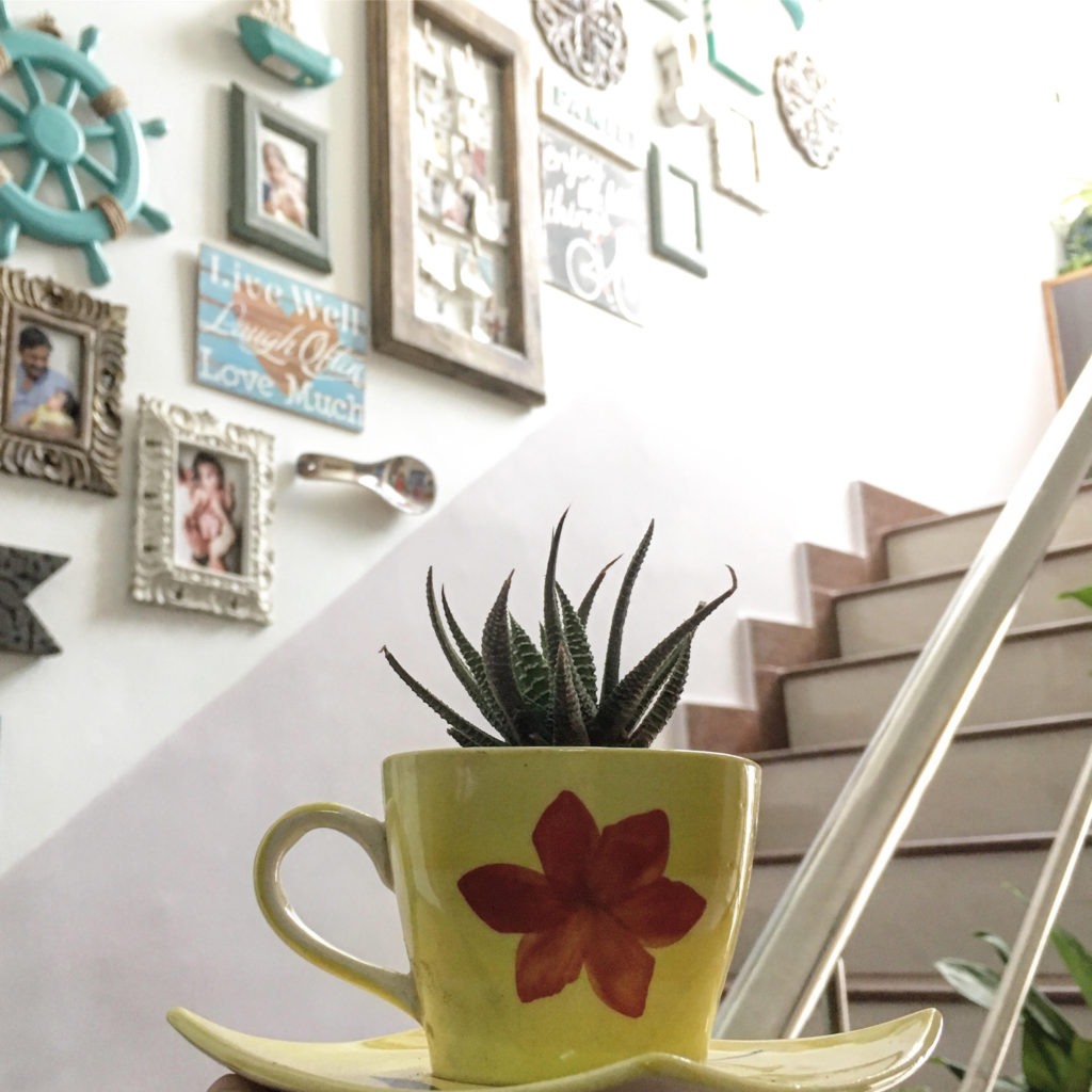 Home decor Tour by Ankita and Sitanshu’s in Lucknow - The stairway decorated the gallery wall with picture frames