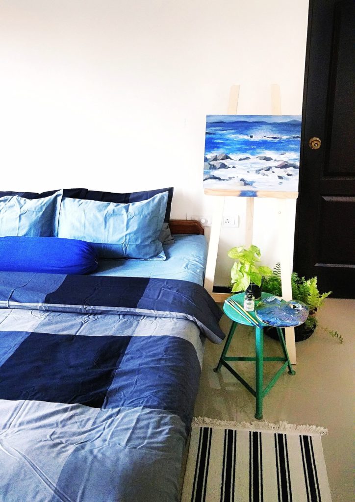 Jayati and Manali share their home tour as the science home décor - the bedroom decorated with green plants, painting frame and rug