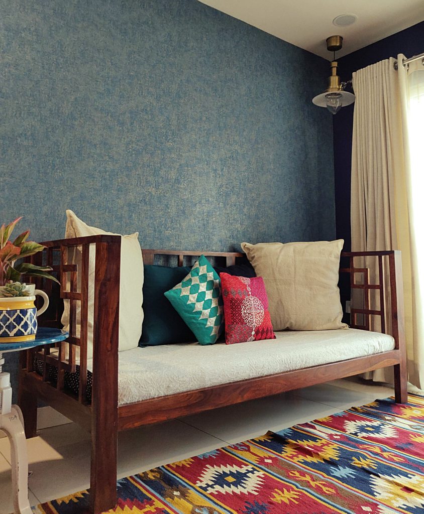 Home style Tour with Rajni in Hyderabad: the collection of colorful rug, cushion covers and plants make the living area super gorgeous