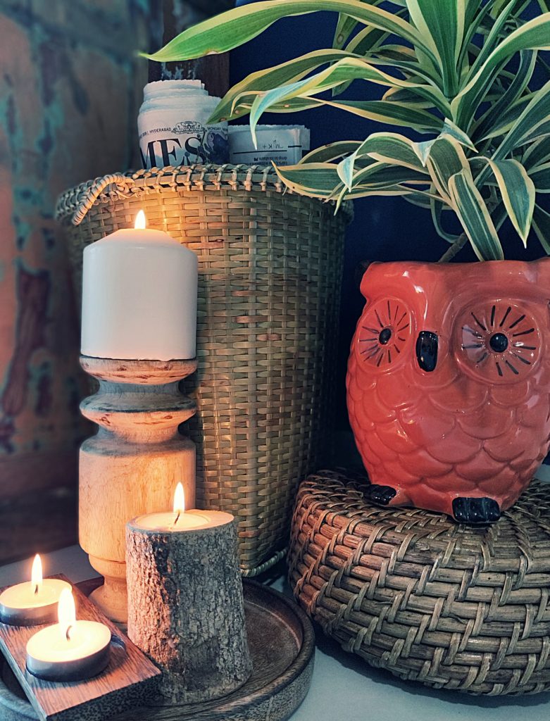 Home style Tour with Rajni in Hyderabad: the collection of owl planter, basket and candle holders makes the corner of the room so beautiful