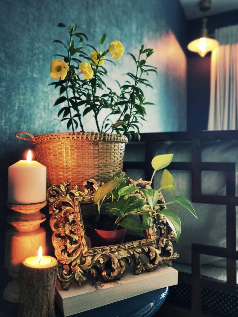 Home style Tour with Rajni in Hyderabad: the room is filled with candles, basket plant and green plants