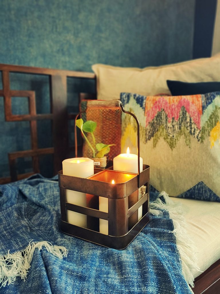 Home style Tour with Rajni in Hyderabad: Using the metal bottle holder as a candle stand and plant holder