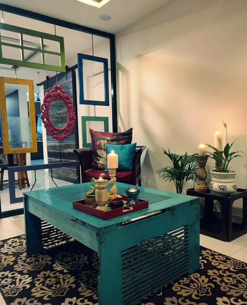 Home style Tour with Rajni in Hyderabad: The teal blue center table was made from an old teak door and given a distressed look