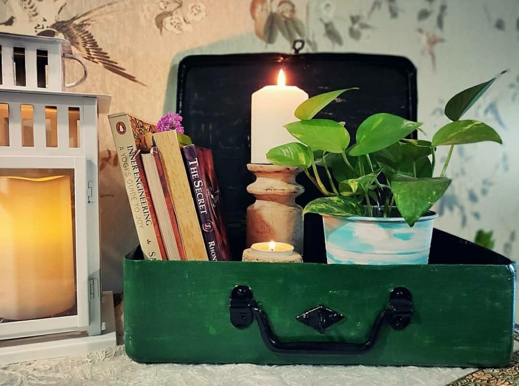 Home style Tour with Rajni in Hyderabad: The old trunk is painted and kept on entryway console to hold books, candles and plants