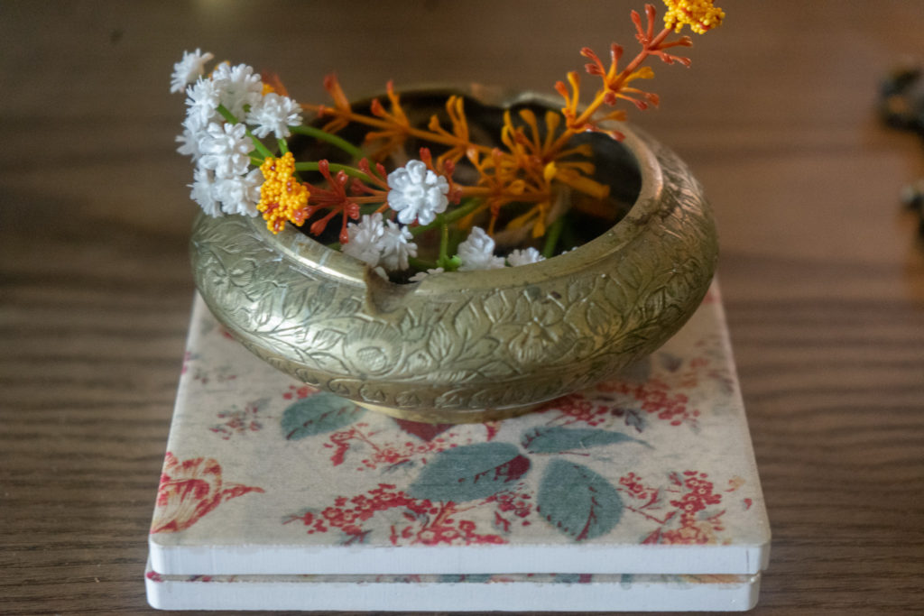 Affinity for antiques and collection of vintage | Home tour of Rushika & Dipkal's - the brass bowl is filled with flower