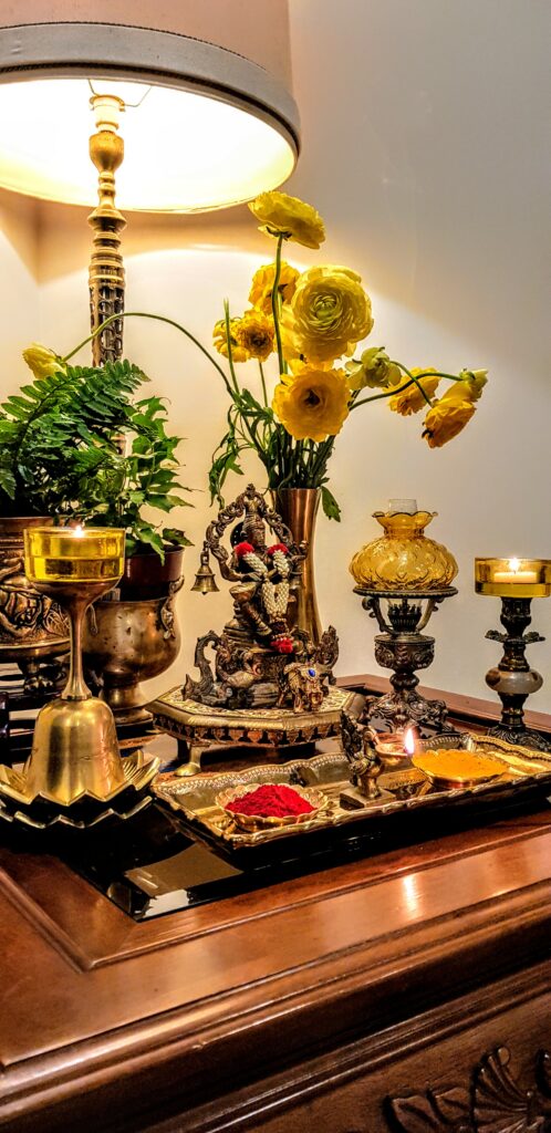 The metals compliment each other and work together with the diyas, flowers to add depth and enhance the beauty of the colorful festival