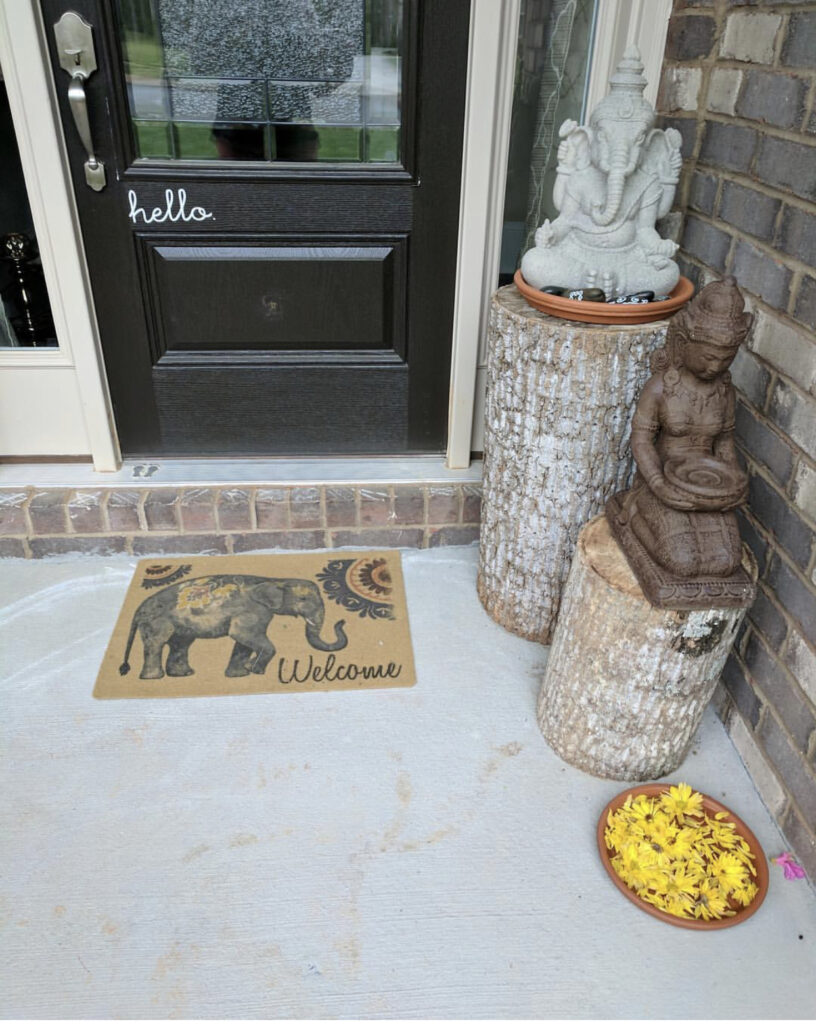Welcome home by placing a statue in front door