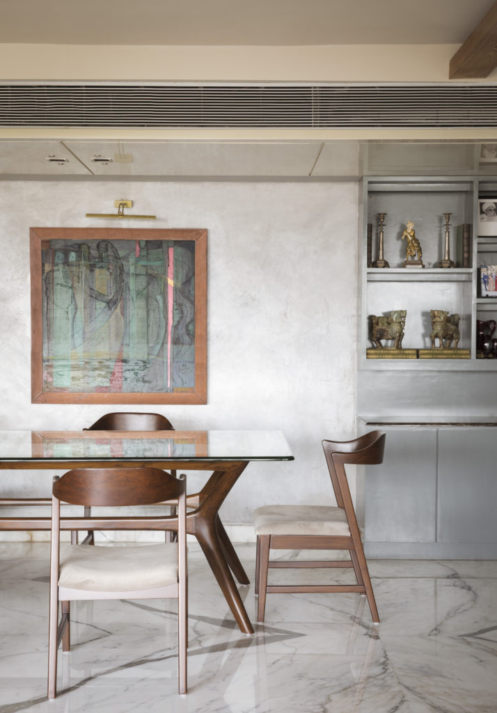 Home Renovation Story | Mohamedi & Durriya Sham's Aesthetic Mumbai Home - The dining table was used a mid-century design and a combination of Burma teak and glass.