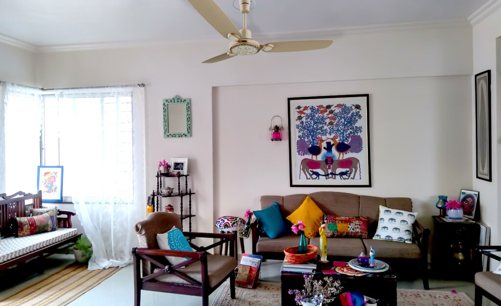 Jaipur Sanganeri Thar Gold from the range of Luminous Signature designer ceiling fans in the living room