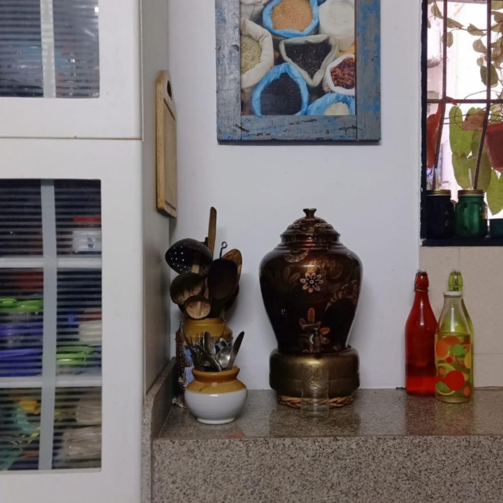 The frame spices and kitchen accessories at the corner of the kitchen | Leesha's Pune home | Thekeybunch