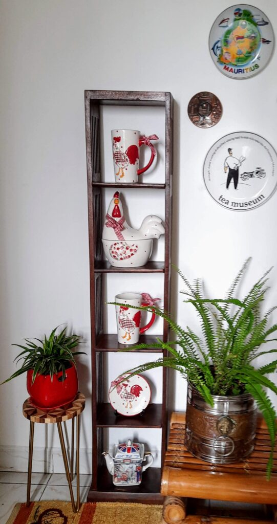 Russian ceramic potteries, green plants and wall frame at the corner of the room | Upasana Talukdar home tour | theKeybunch decor