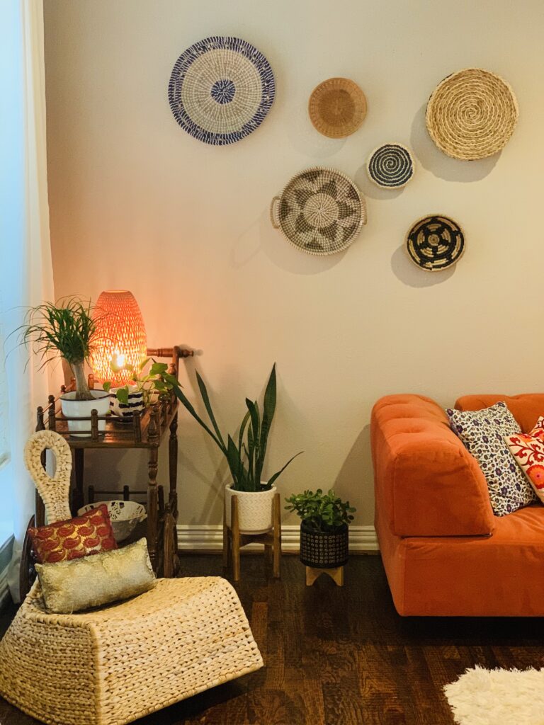 orange sets off the drama on the walls beautifully | Ruma's Indian Home in Texas | theKeybunch decor blog
